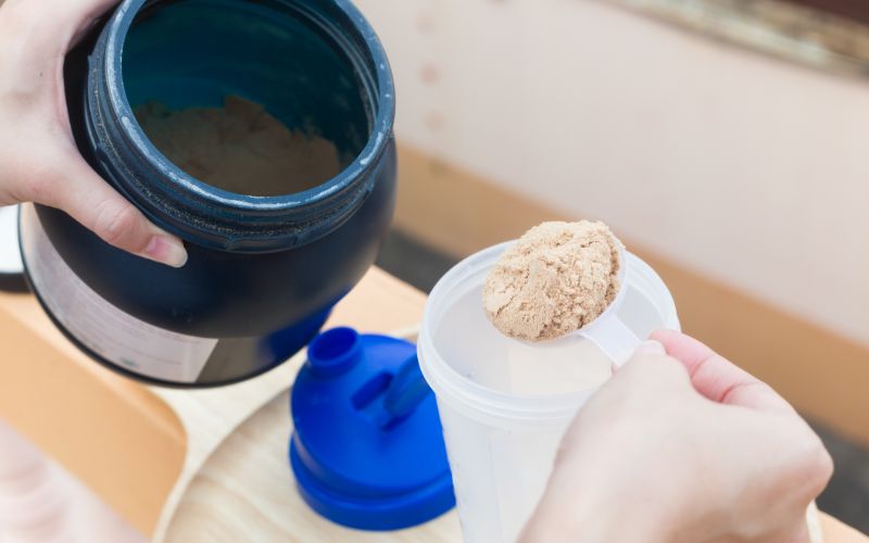 npl-whey-protein-scooping-my-protein-min